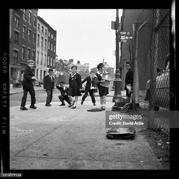 An ethnically diverse group of school children on Henry Street in Brooklyn Heights, in March 1958 in New York City, New York.