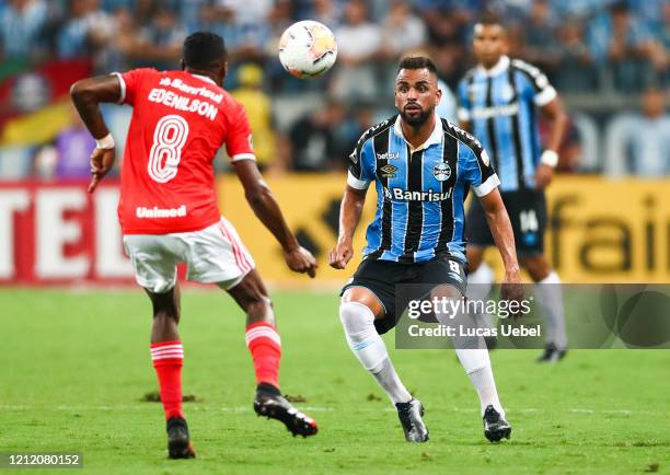 Edenilson of Internacional and Maicon of Gremio fight for the ball during the match for the Copa CONMEBOL Libertadores 2020 at Arena do Gremio on...