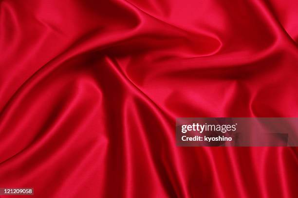 crumpled red satin texture background - red silk stock pictures, royalty-free photos & images