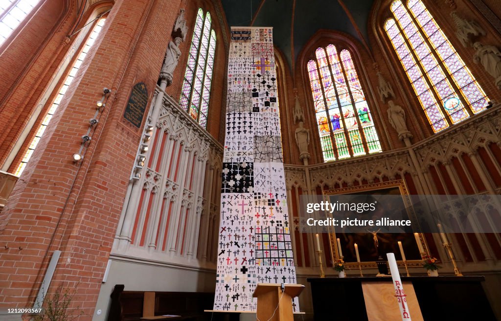 Giant funeral cloth for victims of mass suicide