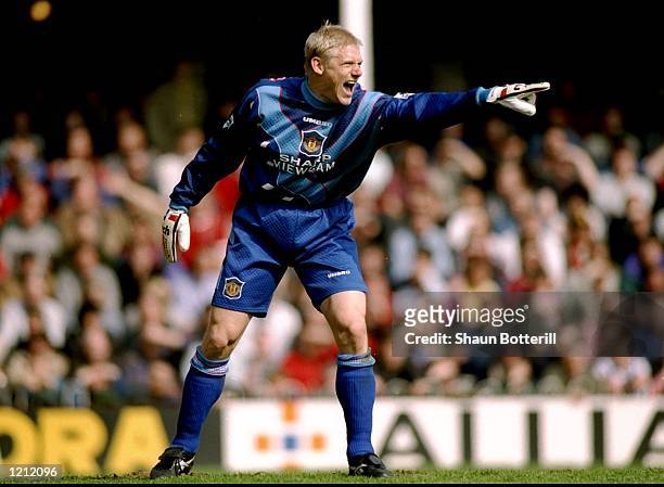 Manchester United goalkeeper Peter Schmeichel indicates to his team mates during an FA Carling Premiership match against Southampton at The Dell in...