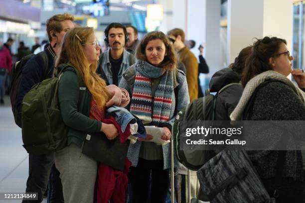 Passengers, including Aleksandra from Poland and Sophia from Germany, who said they will be working as au pairs in New York and booked their flights...