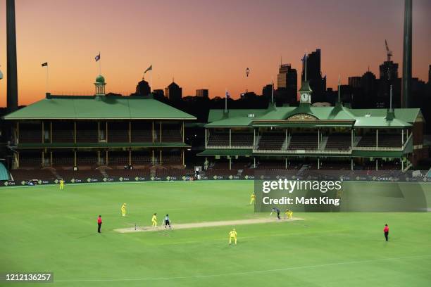 General view of play with empty stands after Cricket Australia announced no public will be admitted to venues for the three match series during game...