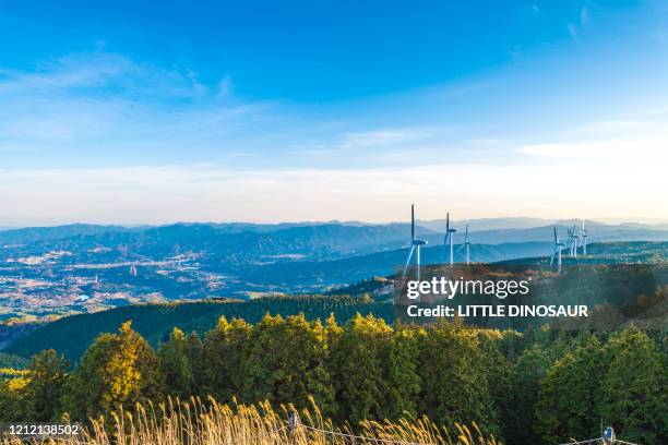 wind power generators standing on the top of the plateau - wind power japan stock pictures, royalty-free photos & images