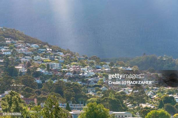 light shining on suburban hobart | tasmania | australia - hobart tasmania 個照片及圖片檔