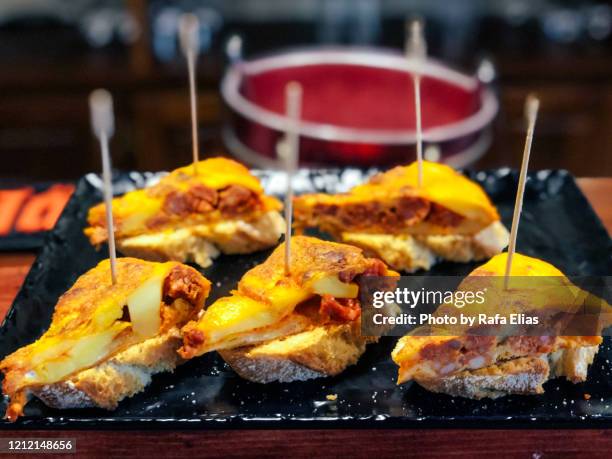 chorizo omelette pinchos - pinchos stock-fotos und bilder