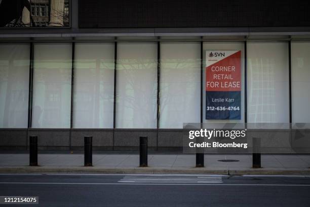 Sign advertises commercial space for rent in Chicago, Illinois, U.S., on Thursday, May 7, 2020. Governor Pritzker extended the state's stay-at-home...