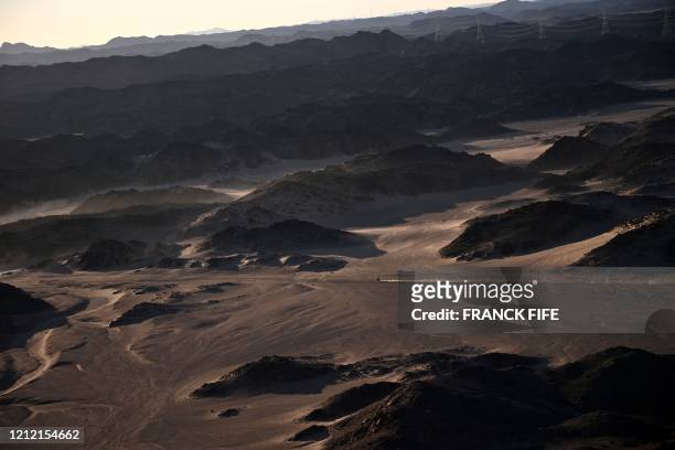 File picture taken on January 6, 2020 during the Dakar 2020 car racing shows a general view of Saudi Arabia's northwestern region, between Neoam and...