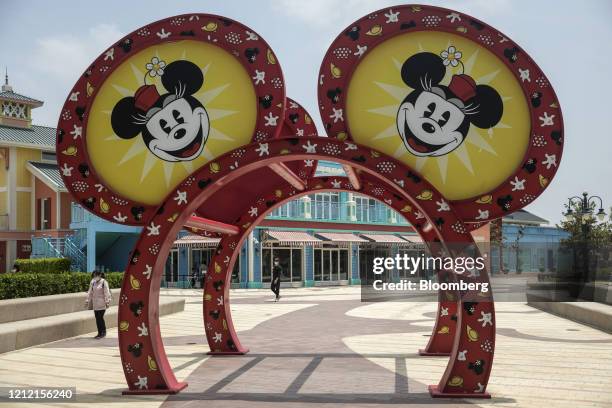 An arch in the shape of Mickey Mouse's ears stands at the Walt Disney Co. Shanghai Disney Resort in Shanghai, China, on Thursday, May 7, 2020. Disney...