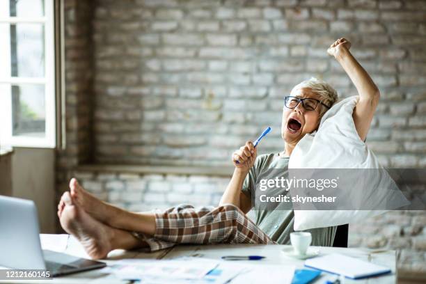 waking up in the office! - yawn office stock pictures, royalty-free photos & images