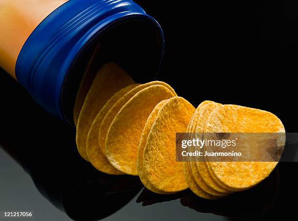 cheddar cheese flavored potato chips - cheddar cheese stock pictures, royalty-free photos & images