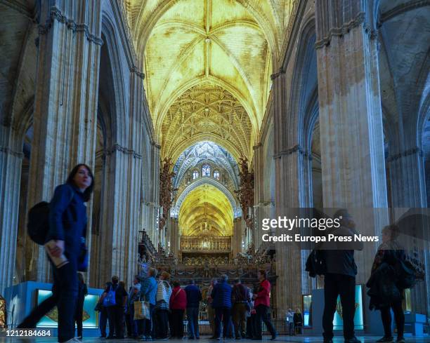 Tourists inside the Cathedral of Seville, which remains open despite the COVDI-19 outbreak on March 13, 2020 in Seville, Spain.