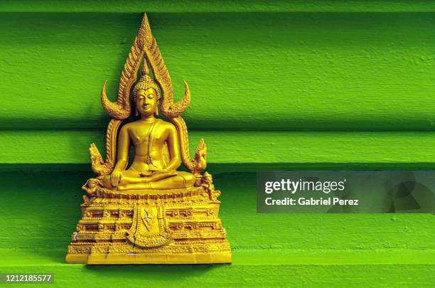 a statue of buddha - theravada stock pictures, royalty-free photos & images