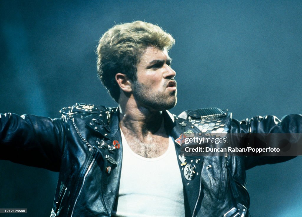 George Michael Instruments Singer George Michael performing during his first solo concert tour ...