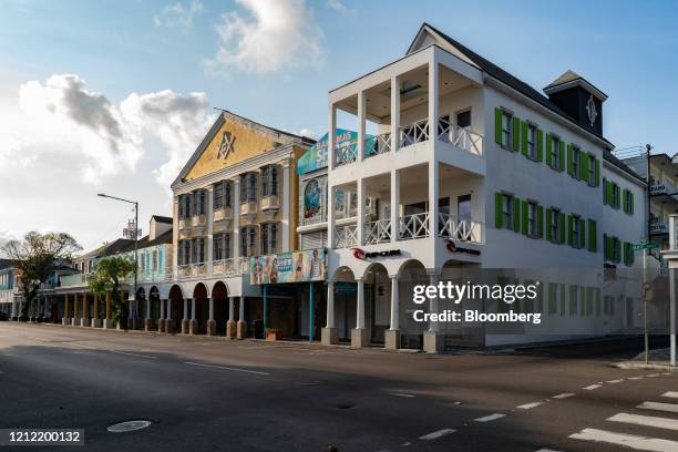 Businesses stand temporarily closed on Bay Street in Nassau, Bahamas, on Friday, April 24, 2020. The Caribbean countries of Barbados, Belize and the...