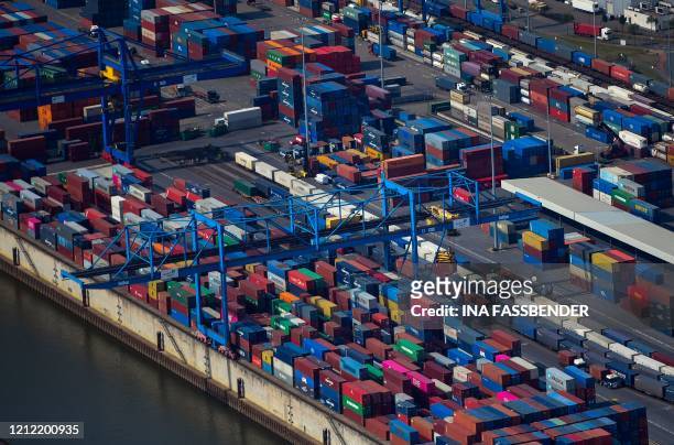 This aerial view shows containers at the harbour of Duisburg, western Germany, on May 8, 2020.