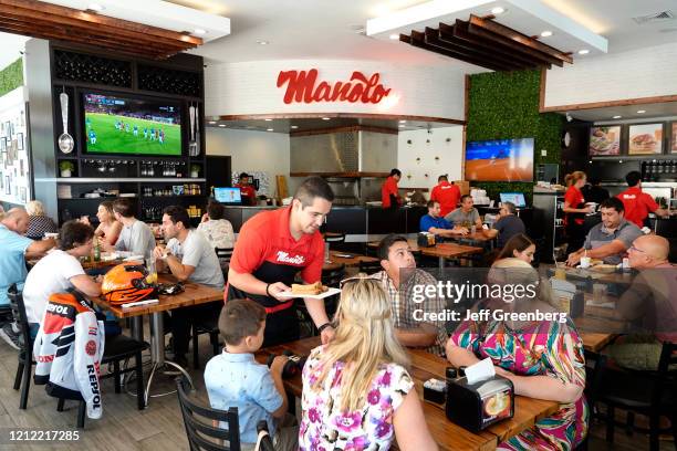 Miami Beach, Manolo, Argentinean restaurant, busy dining room.