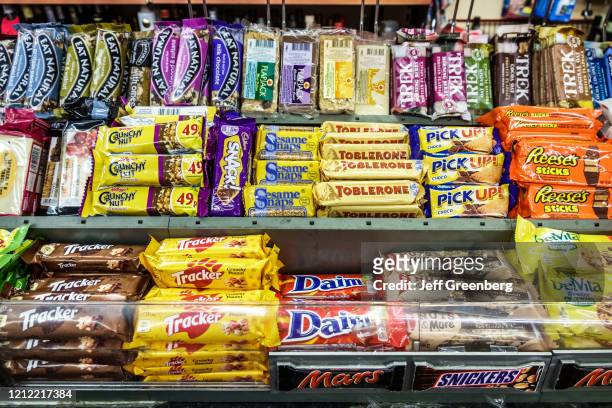London, Snickers, Tracker, Mars, Toblerone and Reese's candy on display.