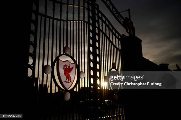 Dusk falls over The Paisley Gates at Anfield Stadium, the home Liverpool Football Club on March 13, 2020 in Liverpool, United Kingdom. It has been...