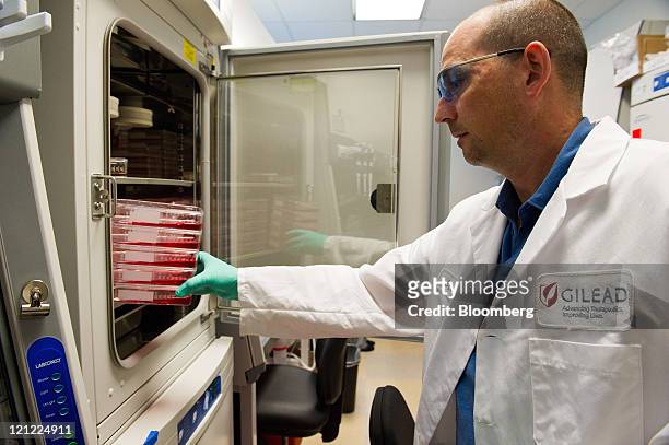 Scott McCauley, an associate scientist at Gilead Sciences Inc., makes human proteins at the Gilead laboratory in Foster City, California, U.S., on...