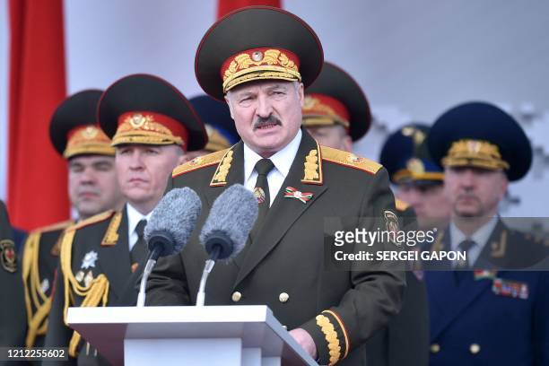 Belarus' President Alexander Lukashenko gives a speech during a military parade to mark the 75th anniversary of the Soviet Union's victory over Nazi...