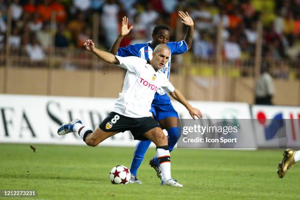 Ruben BARAJA of Valencia and BENNI McCARTHY of Porto during the Super Cup match between Porto CF and Valencia at Stadium Louis II, Monaco on 27th...