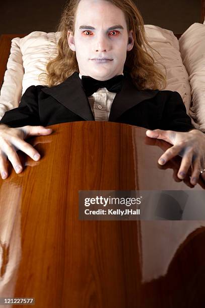 vampire in coffin - vampire coffin stock pictures, royalty-free photos & images