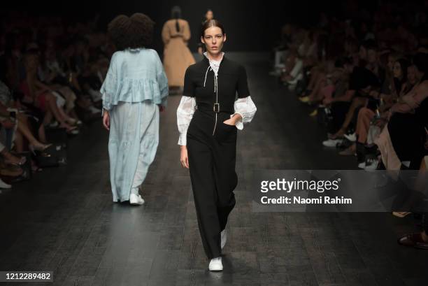 Models walk the runway in designs by White Story during Runway 2 at Melbourne Fashion Festival on March 11, 2020 in Melbourne, Australia.