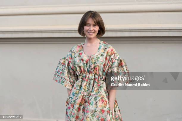 Guest wears a Romance Was Born dress ahead of Runway 1 at Melbourne Fashion Festival on March 11, 2020 in Melbourne, Australia.