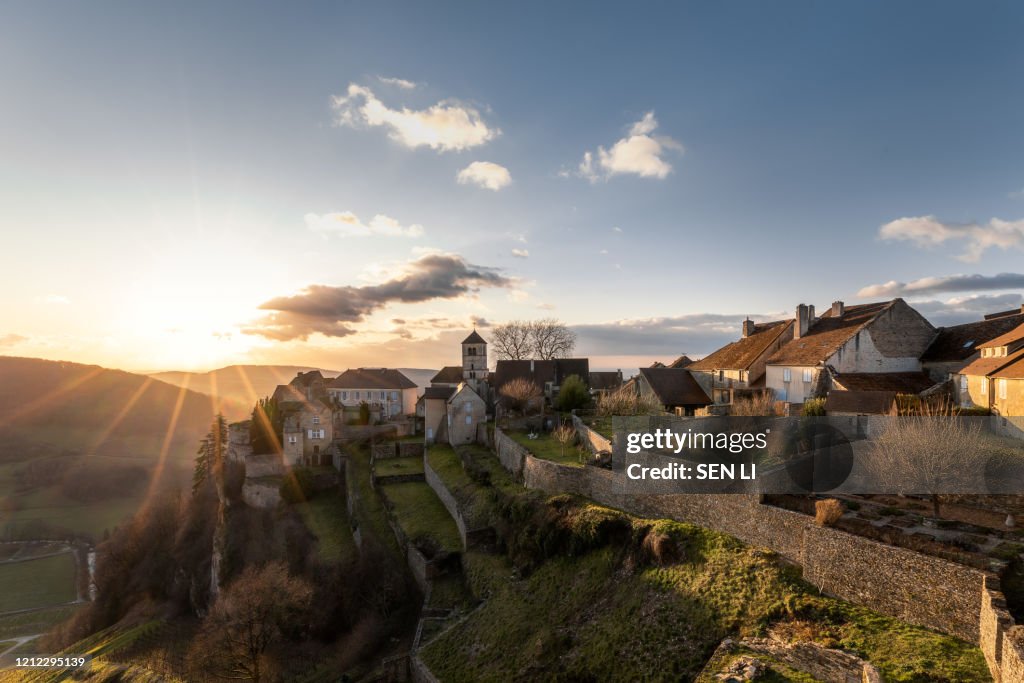 Sunset landscapes of an ancient castle, medieval French town in Chateau-Chalon, Burgundy, France