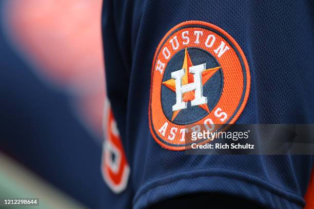 The Houston Astros logo on the arm of their jersey during a spring training baseball game against the St. Louis Cardinals at Roger Dean Chevrolet...
