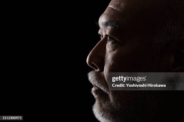 close-up of head portrait of mature man in 50s - japanese old man foto e immagini stock