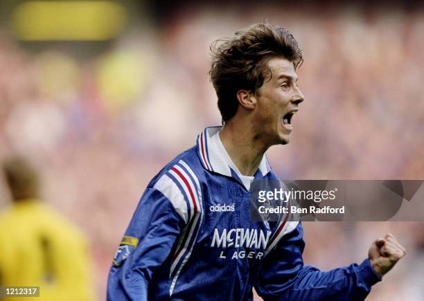 Brian Laudrup of Rangers celebrates their second goal during a Scottish Premier League match against Aberdeen at Ibrox Stadium in Glasgow, Scotland....