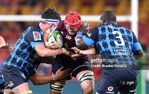 Harry Wilson of the Reds takes on the defence during the round seven Super Rugby match between the Reds and the Bulls on March 14, 2020 in Brisbane,...