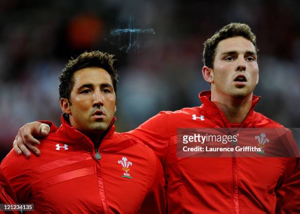 Gavin Henson and George North of Wales sing the national anthem prior to kickoff during the rugby union international friendly match between Wales...