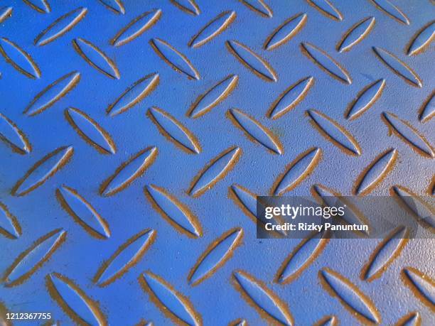 blue stainless steel metal plate with crosshatch non-slip texture - rivet stock pictures, royalty-free photos & images