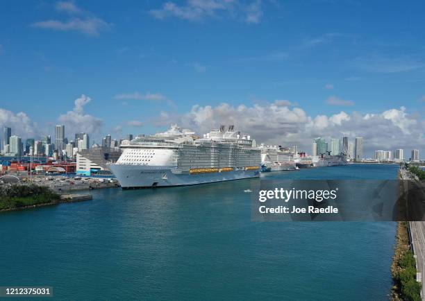 An aerial view from a drone shows the Royal Caribbean Symphony of the Seas Cruise ship which is the world's largest passenger liner docked at...