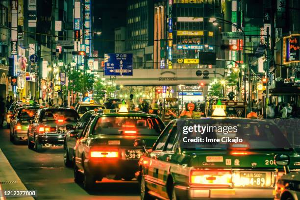 roppongi by night - roppongi stock pictures, royalty-free photos & images