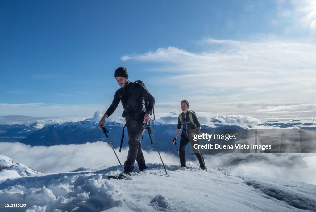 Couple of climbers on a snowy slope