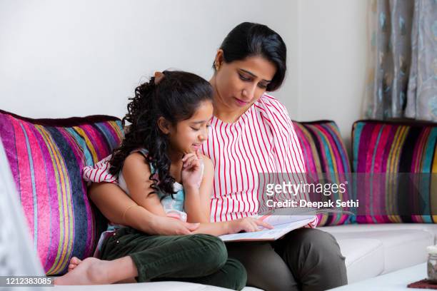 happy mom and daughter stock photo - indian mother daughter stock pictures, royalty-free photos & images