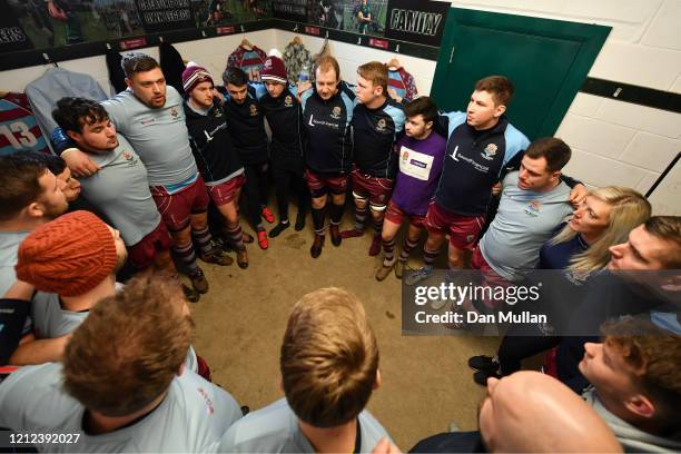 The OPM players huddle in the changing room prior to the Lockie Cup Semi Final match between Old Plymouthian and Mannameadians and Plymstock Albion...