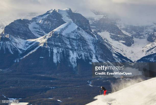 Female skier is riding alone on a slope on November 19, 2014 in Lake Louise, Canada.