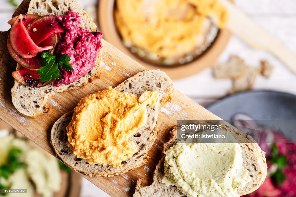 Eating healthy vegan snacks, gourmet sandwiches variety
