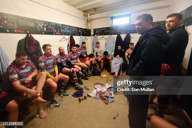 The OPM players sit dejected in the changing room following their defeat during the Lockie Cup Semi Final match between Old Plymouthian and...