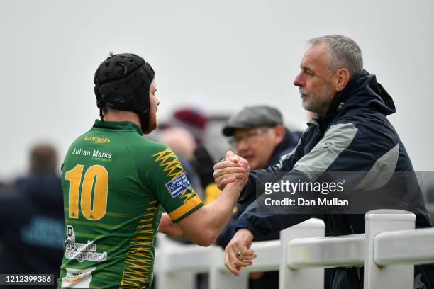 Tom Richards of Plymstock Albion Oaks is congratulated following his side's victory during the Lockie Cup Semi Final match between Old Plymouthian...