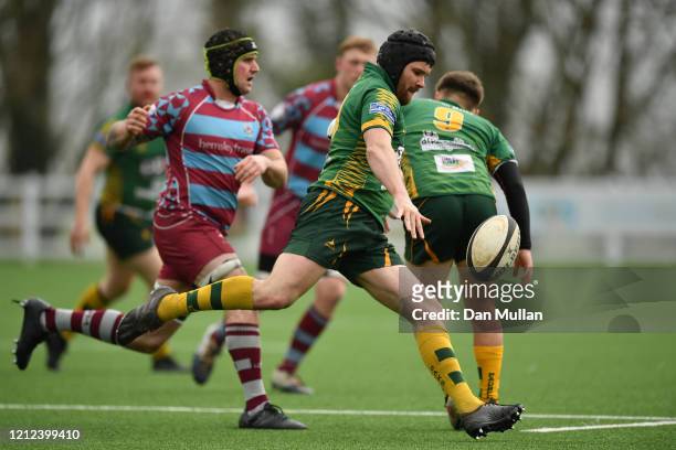 Tom Richards of Plymstock Albion Oaks sends the ball upfield during the Lockie Cup Semi Final match between Old Plymouthian and Mannameadians and...