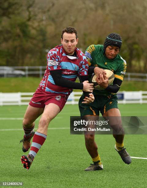 Chris Harmer of OPMs and Nicholas Bono Machado of Plymstock Albion Oaks compete for the ball during the Lockie Cup Semi Final match between Old...