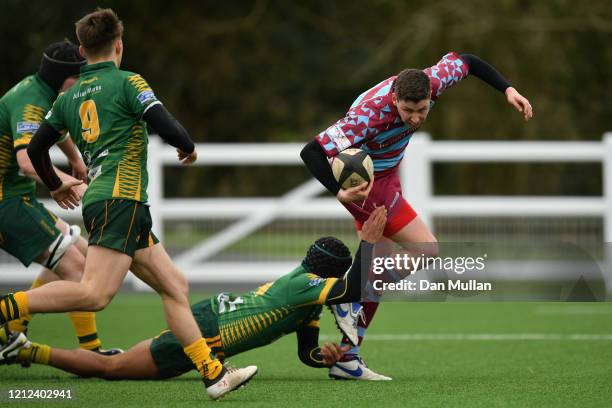 Peter Regan of OPMs makes a break past Nicholas Bono Machado of Plymstock Albion Oaks during the Lockie Cup Semi Final match between Old Plymouthian...