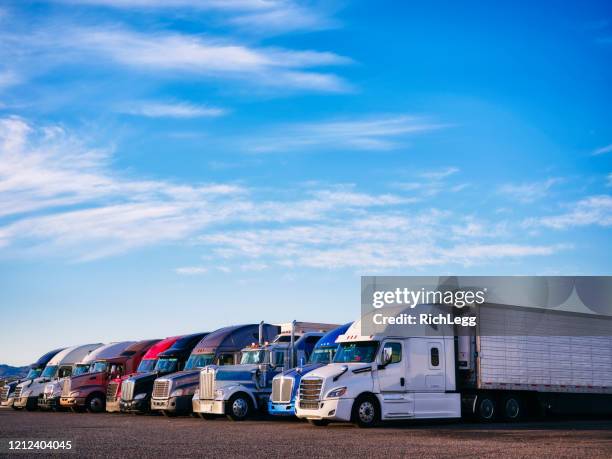 long haul semi trucks - convoy stock pictures, royalty-free photos & images