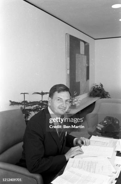 David Rockefeller , American banker, served as chairman and chief executive of Chase Manhattan Corporation, in his office, 1962.